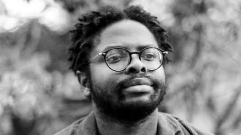 A headshot of the poet Gboyega Odubanjo