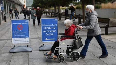 Members of the public at a vaccination centre