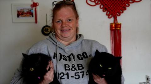 Miari Workman with her cats