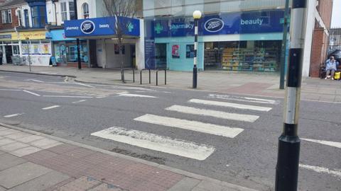 Zebra crossing on St Peters Avenue, Cleethorpes, there are shops on the opposite side of the road