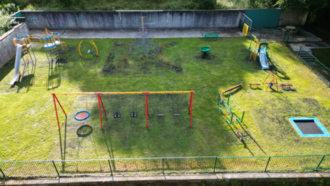 The new Bannawell Street play park is a grassed area including a set of five swings, slide and climbing aparatus and a trampoline