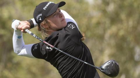 Mimi Rhodes admires a drive