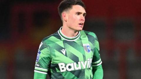 Marcus Wyllie in green Gillingham change strip