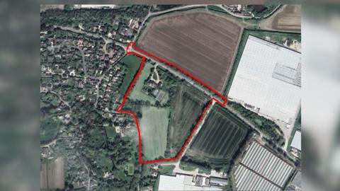 A map showing a proposal to build up to 92 homes in a village.
