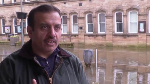 Councillor Mohammed Iqbal speaking to the BBC outside the town hall in Nelson