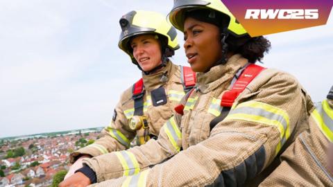 emma louise with Jade Konkel in firefighter uniform