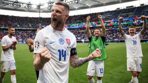 Milan Skriniar celebrates