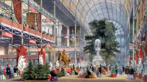 Colour drawing of the inside of the Crystal Palace with people on the ground floor beside the fountain and with a large tree in the background