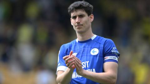 Callum O'Dowda applauds at the end of a game