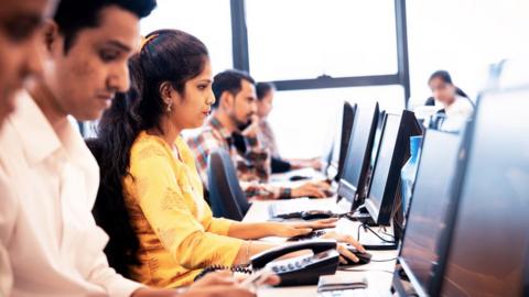 Group of Call Center Executives Working During their Shift - stock photo