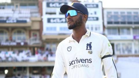 Kraigg Brathwaite walks out at The Oval to make his Warwickshire debut - little over 12 hours after flying in