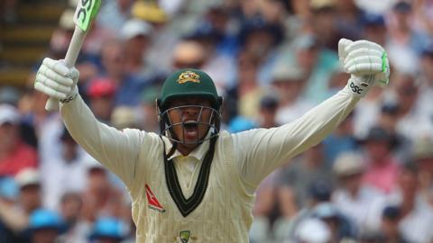 Usman Khawaja celebrates