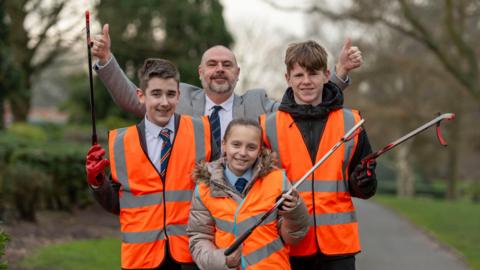 Jack, Councillor Craig Collingswood and Lennon with front, Freya 