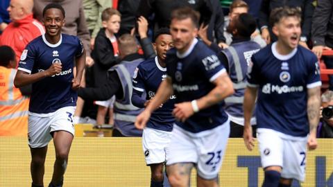 Ra'ees Bangura-Williams celebrates with his Millwall teammates