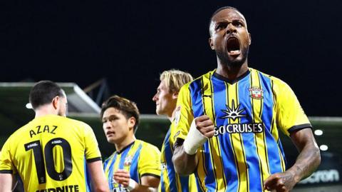 Cyle Larin celebrates 