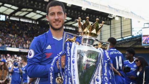 Eden Hazard of Chelsea poses with the Premier League trophy