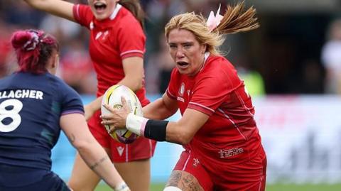 Georgia Evans in action against Scotland