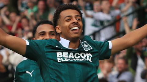 Caleb Watts celebrates scoring for Plymouth Argyle
