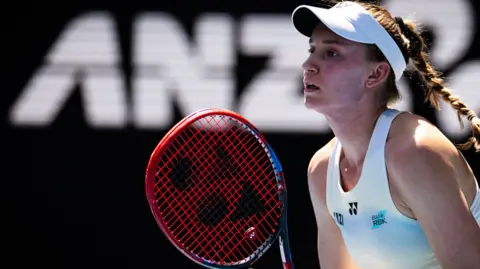 Iga Swiatek hits a forehand