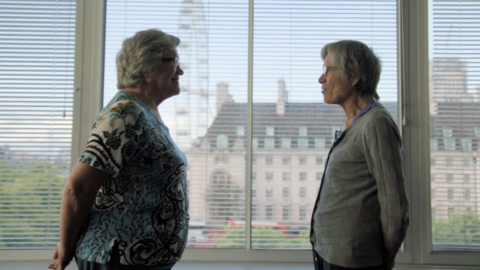 Twins Jackie and Gillian stand face to face