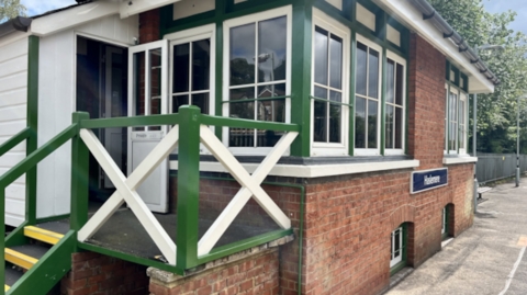 The exterior of Haselmere signal box.