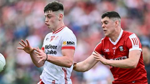 Tyrone goalscorer Ben Cullen is about to win possession ahead of Cork's Rory Maguire