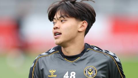 Kiban Rai warming up before a Newport game