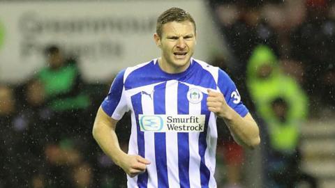 Striker Paul Mullin in action for Wigan Athletic