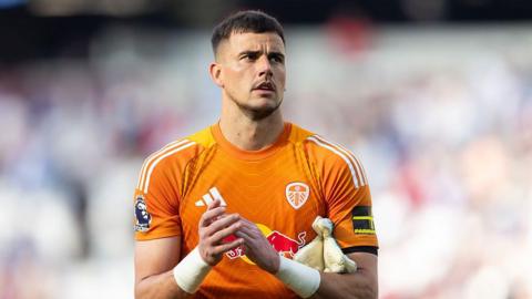 Leeds United goalkeeper Karl Darlow applauds the fans