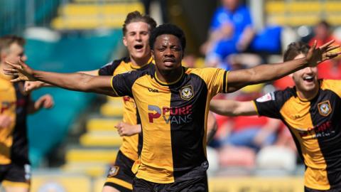 Bobby Kamwa celebrates