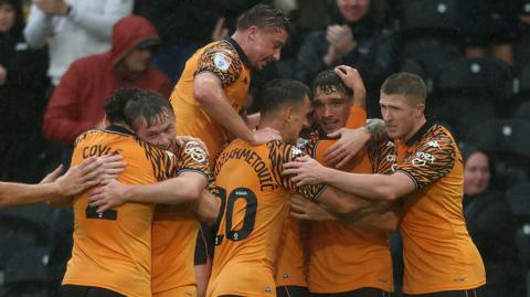 Hull City celebrate their opening goal against Southampton