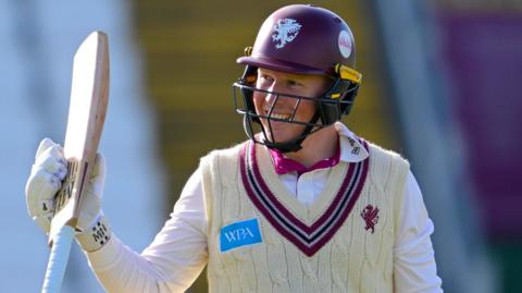 James Rew celebrates scoring fifty