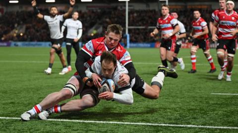 Ivan van Zyl dives over for Saracens' fourth try in their Prem victory over Gloucester at Kingsholm