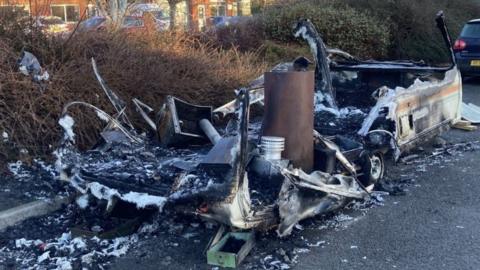 A caravan destroyed by a fire on the Marsh Barton industrial estate in Exeter