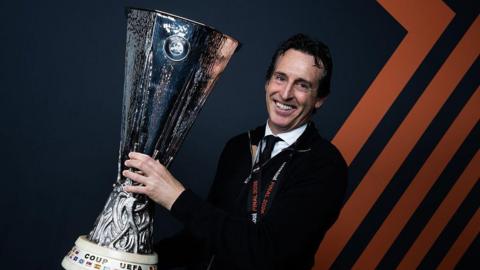 Unai Emery with the Europa League trophy