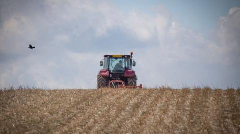 Tractor in field