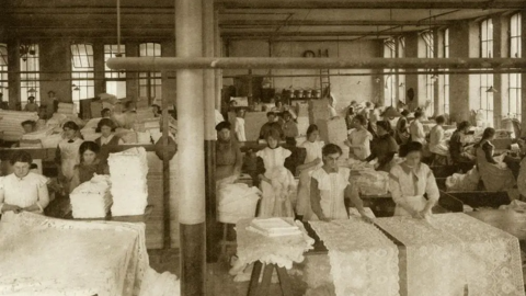 A black and white photo of lace-making in Nottingham