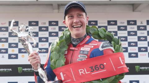Dean Harrison celebrates his win