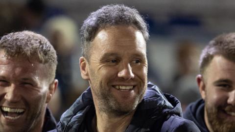 Mark Jones addresses the Ospreys players after a game