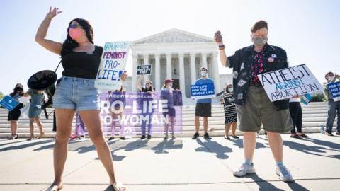 Anti-abortion protesters seen outside the Supreme Court