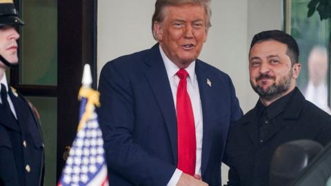 Trump greets Zelensky outside White House