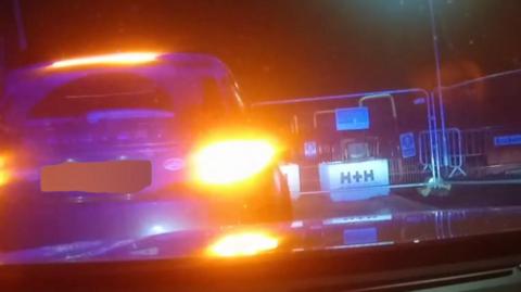 Car dashcam of police pursuit