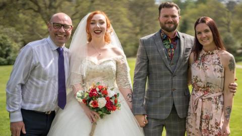 Tim Hodgson (far left) and Laura Hugget (far right) at the wedding of Chris Hinchcliffe (middle right)