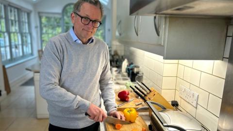 Michael Mosley cooking in the kitchen