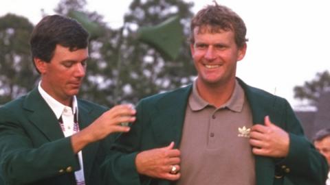 Sandy Lyle being helped into his Green Jacket by Larry Mize at Augusta National in 1988