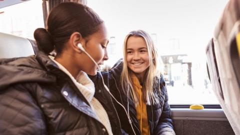 Friends on a bus