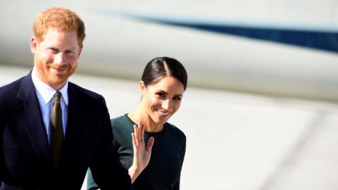 Prince Harry and his wife Meghan, the Duke and Duchess of Sussex