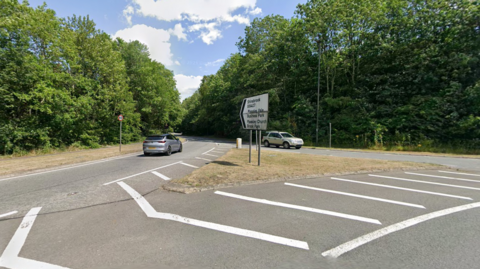 The entrance to a road from a roundabout