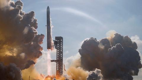 The SpaceX Starship and Super Heavy Booster creates sound waves and plumes of smoke as it lifts off on its 12th test flight from the SpaceX launch complex in Starbase, Texas, U.S.