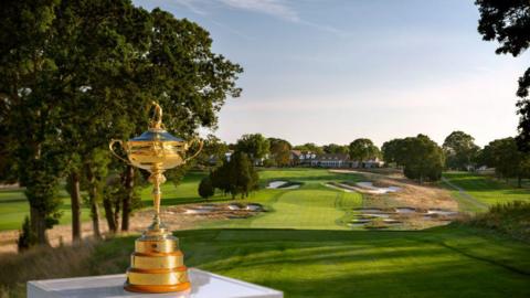 Ryder Cup trophy in front of Bethpage Black Golf Course.